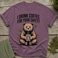 Bear holding coffee cup with text "I DRINK COFFEE FOR YOUR SAFETY".