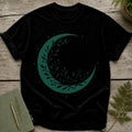 Black t-shirt with green crescent moon and leaf design