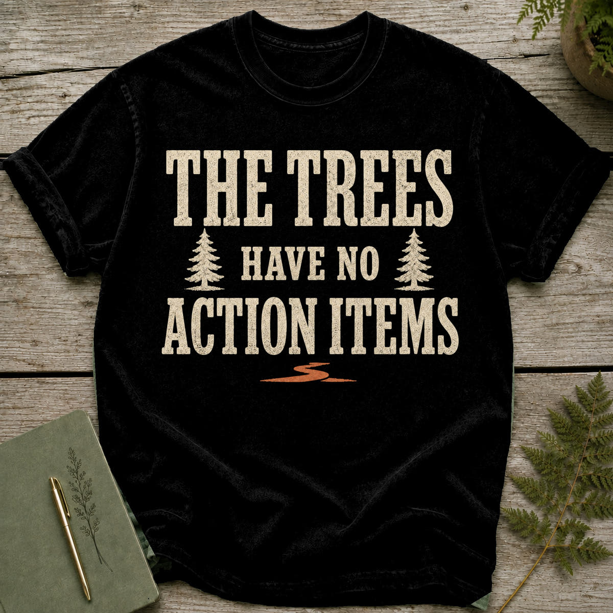 Black t-shirt with text "The Trees Have No Action Items" and tree graphics.
