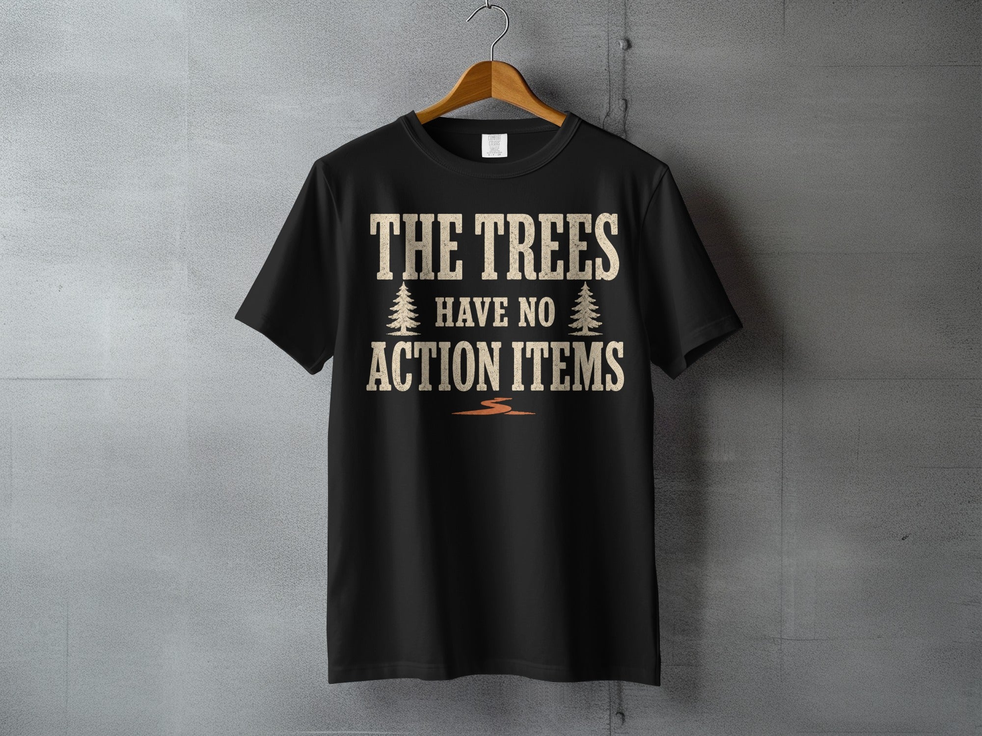 Black t-shirt with text "THE TREES HAVE NO ACTION ITEMS".