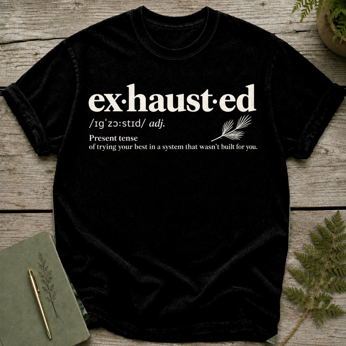 Black t-shirt with "exhausted" definition and humorous explanation.