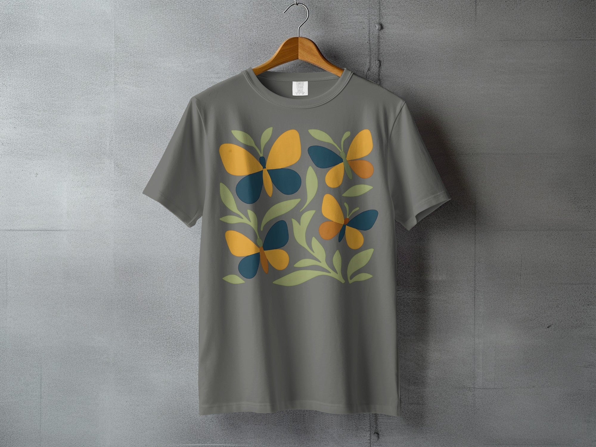 Grey Butterfly Foliage Abstract Print Graphic Tee product type
Grey T-shirt
Butterfly design
Graphic apparel
Abstract artwork
Foliage print
Nature motif
Insect graphic
Blue orange shirt
Green leaf pattern
Modern aesthetic
Short sleeve tee
Round neck top
Casual shirt
Unisex tee
Summer outfit
Spring apparel
Unique pattern
Artistic graphic
Fashion top
Butterfly art