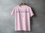 Light pink t-shirt with "A quiet walk for a loud mind" text.