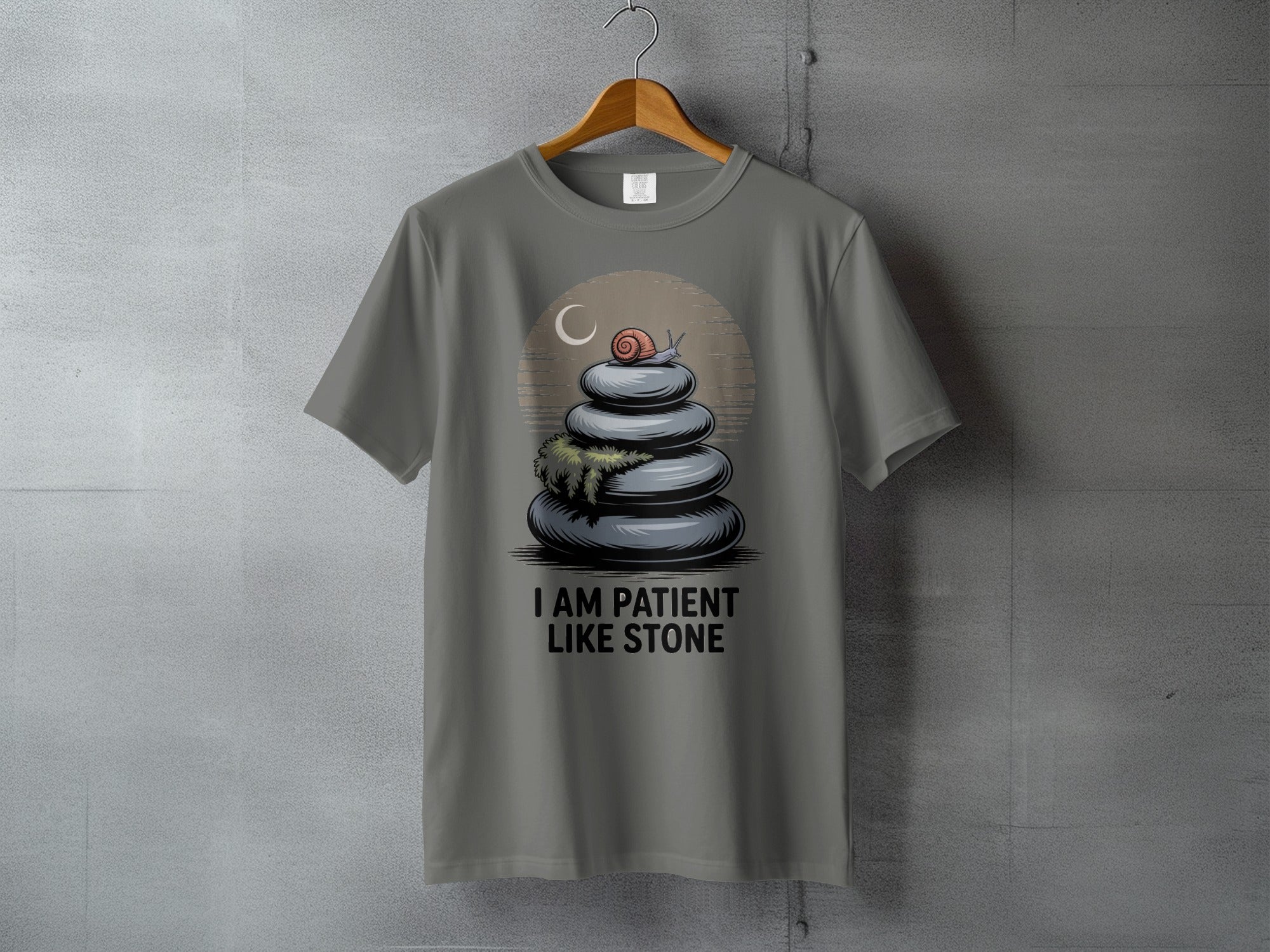 I AM PATIENT LIKE STONE Snail Zen Stones Tee product type
snail
patience
zen
stone stack
meditation
calm
spiritual
nature
moon crescent
quote shirt
graphic tee
unique design
inspirational
serenity
slow living
cairn stones
mindfulness
gray apparel
fashion top
relaxed style