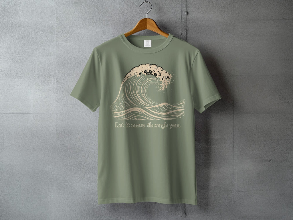 Olive green t-shirt with a wave graphic and text reading "Let it move through you."