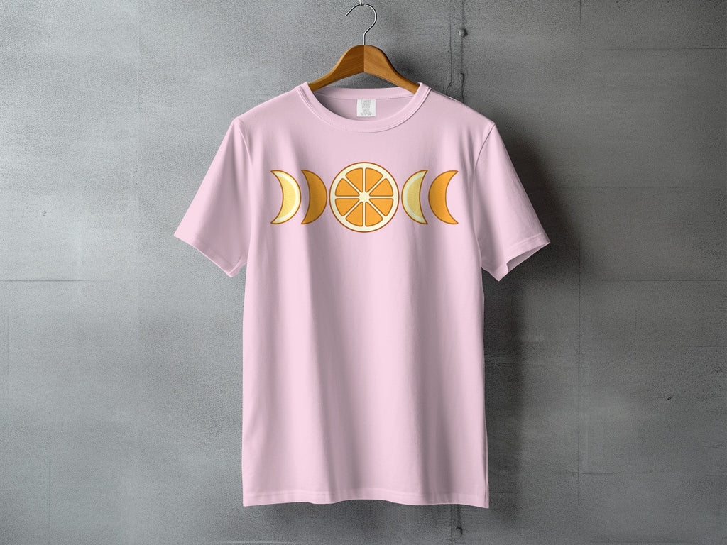 Pink Orange Citrus Moon Phases Celestial Design T-shirt
T-shirt, Pink shirt, Orange slice, Moon phases, Celestial, Citrus fruit, Graphic tee, Aesthetic top, Boho fashion, Lunar design, Triple moon, Goddess shirt, Summer style, Unique print, Mystical tee, Nature theme, Astrology gift, Indie clothing, Spiritual apparel, Pastel pink