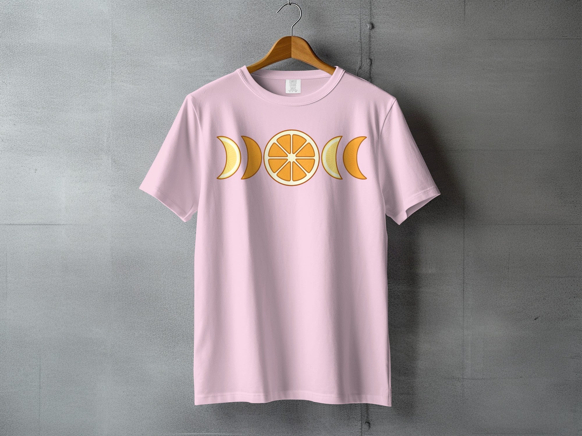 Pink Orange Citrus Moon Phases Celestial Design T-shirt
T-shirt, Pink shirt, Orange slice, Moon phases, Celestial, Citrus fruit, Graphic tee, Aesthetic top, Boho fashion, Lunar design, Triple moon, Goddess shirt, Summer style, Unique print, Mystical tee, Nature theme, Astrology gift, Indie clothing, Spiritual apparel, Pastel pink