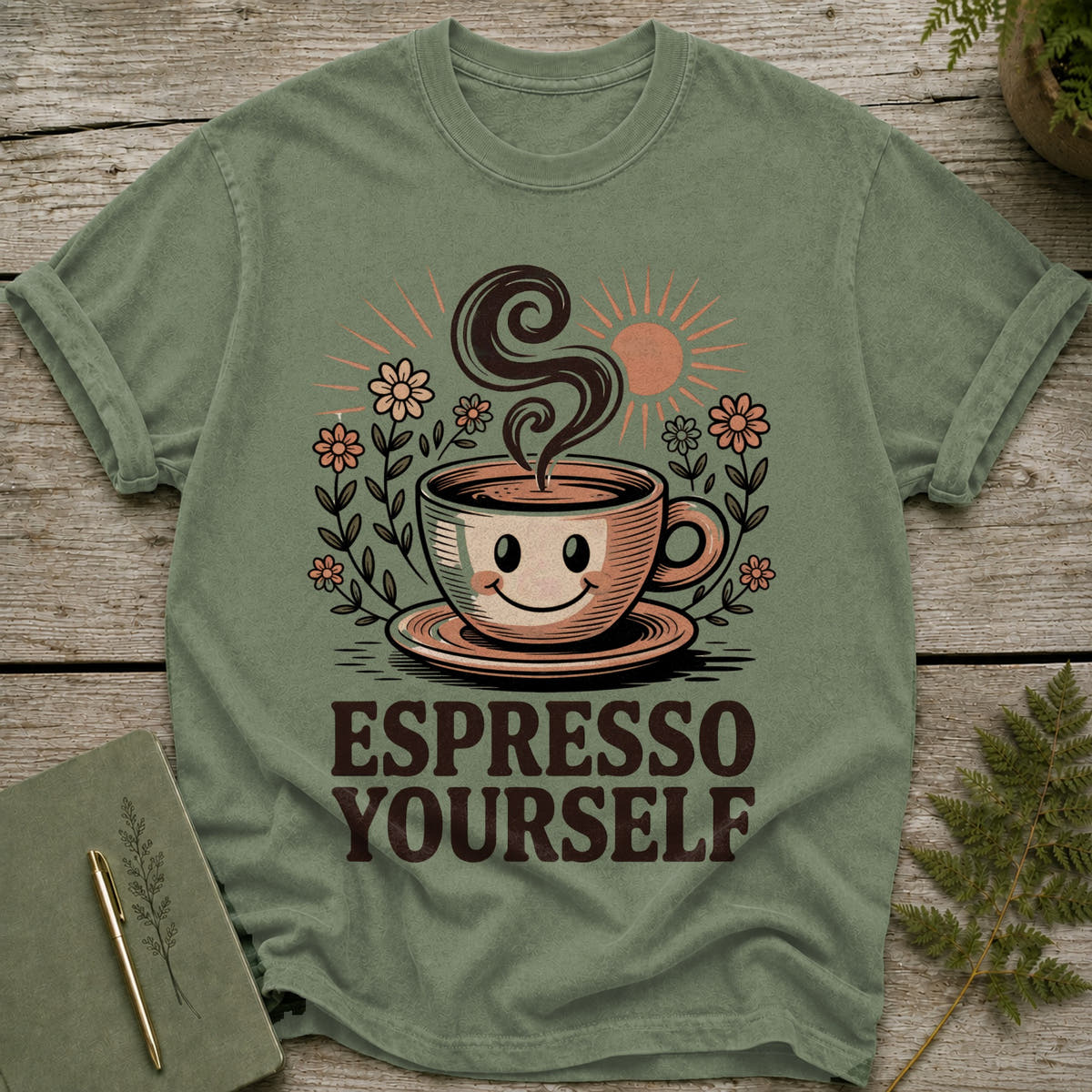 Green t-shirt with a smiley face coffee cup and "Espresso Yourself" text.
