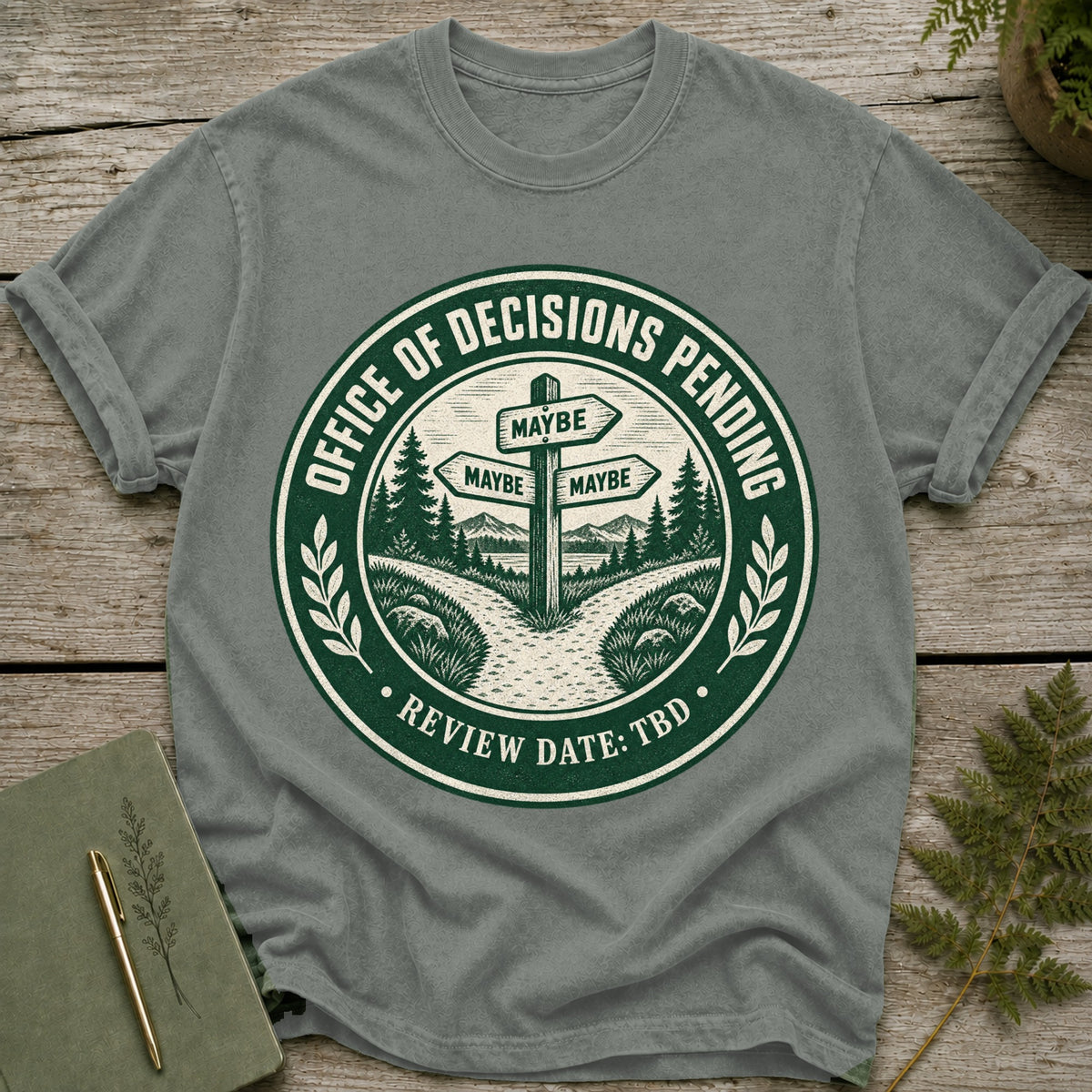Grey t-shirt with "Office of Decisions Pending" and "Review Date: TBD" text.