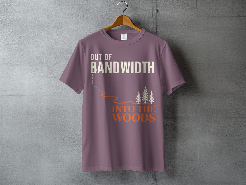 T-shirt with "Out of Bandwidth Into The Woods" text and forest graphic.