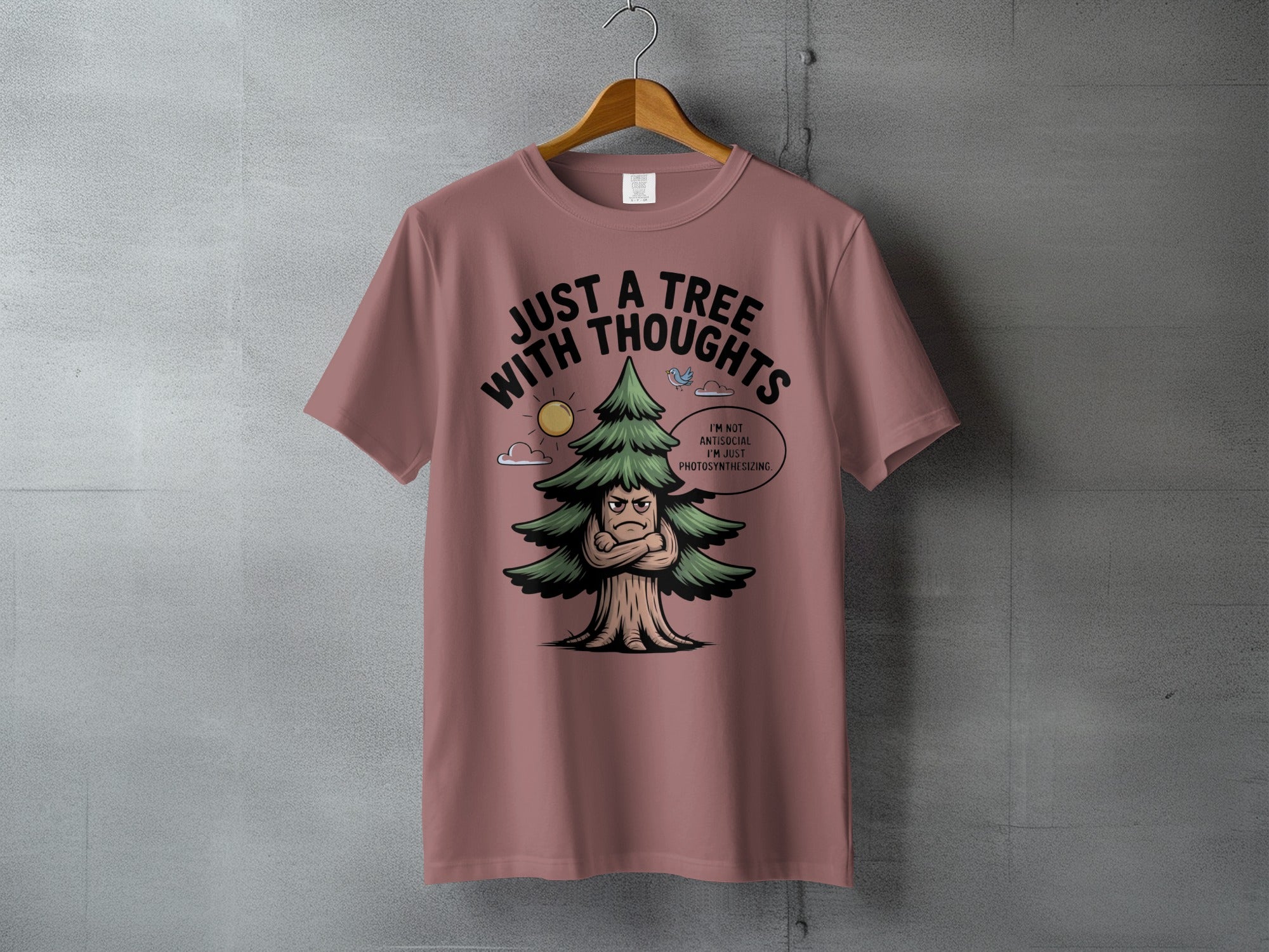 Just A Tree With Thoughts Photosynthesizing T-Shirt product type
Grumpy Tree
Photosynthesis
Antisocial Humor
Tree Thoughts
Nature Lover
Plant Life
Funny Graphic
Introvert Shirt
Sarcastic Design
Evergreen Tree
Woodland Theme
Forest Enthusiast
Unique TShirt
Statement Apparel
Humorous Tee
Botanical Art
Casual Top
Outdoorsy Style
Greenery Design
Cute Cartoon Tree