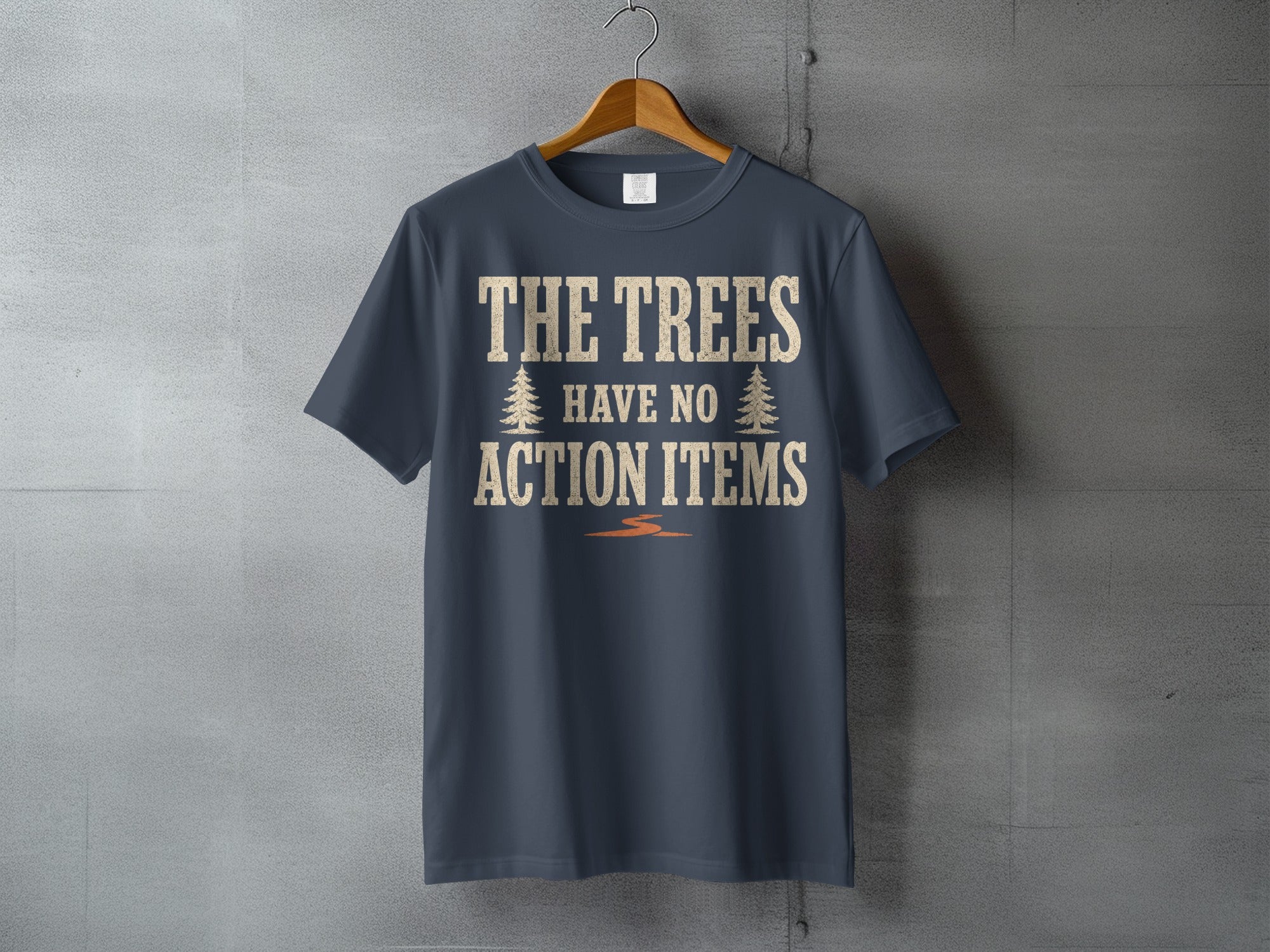 Dark gray t-shirt with text "THE TREES HAVE NO ACTION ITEMS"