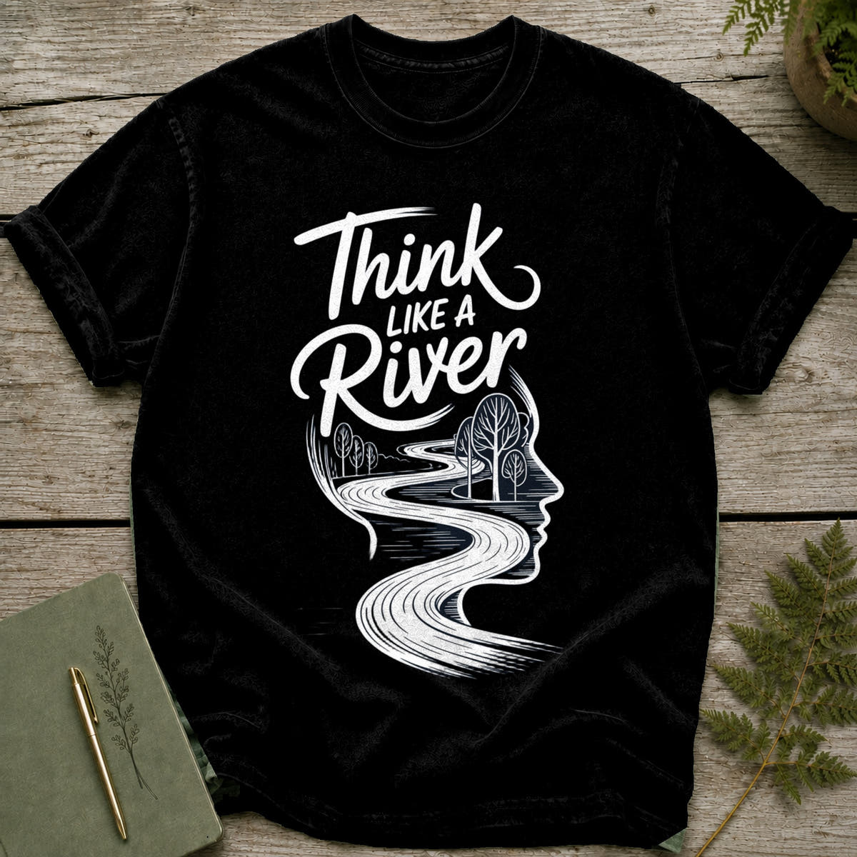 Black t-shirt with white text "Think Like A River" and a river flowing through a profile.