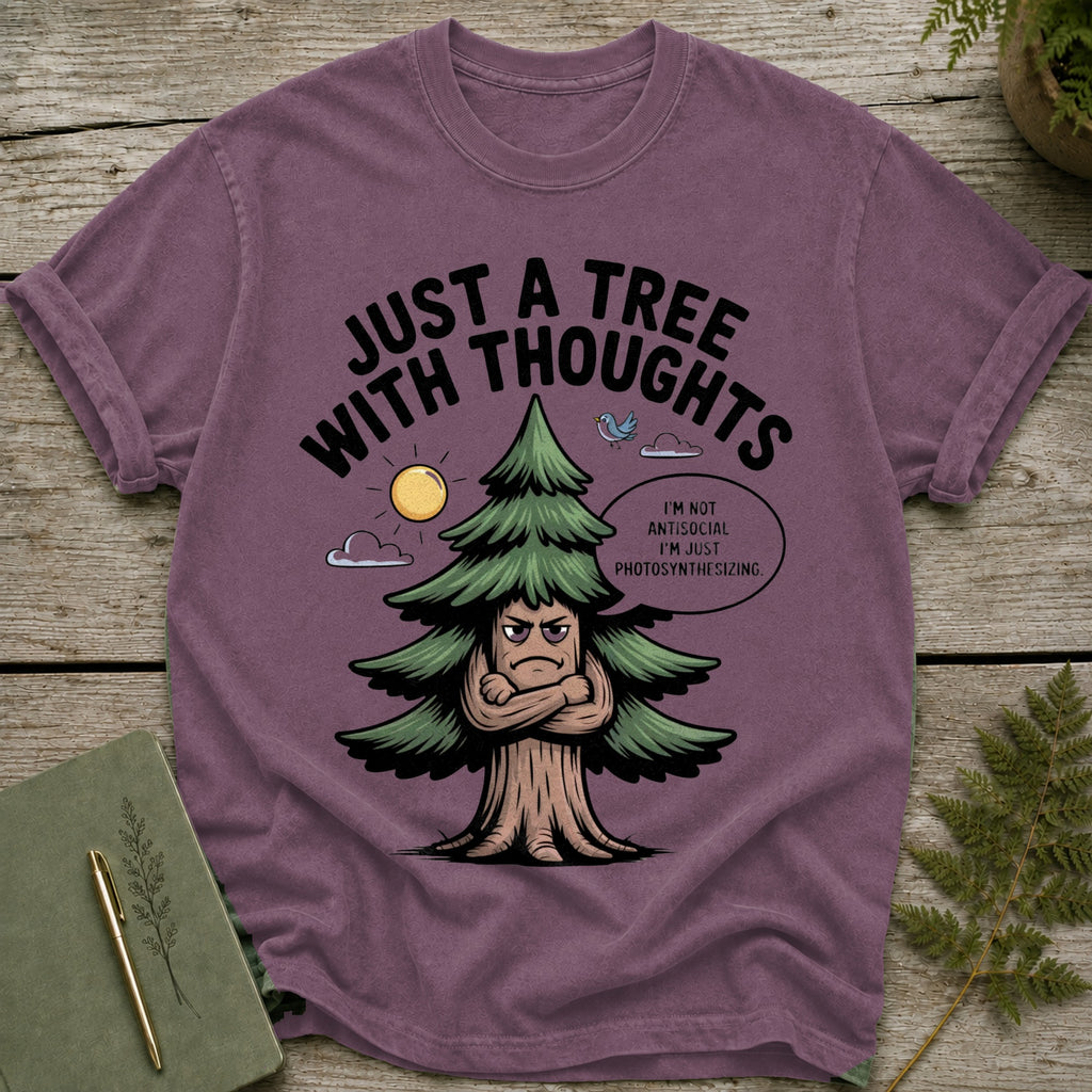 T-shirt with a cartoon tree that says "Just a tree with thoughts."